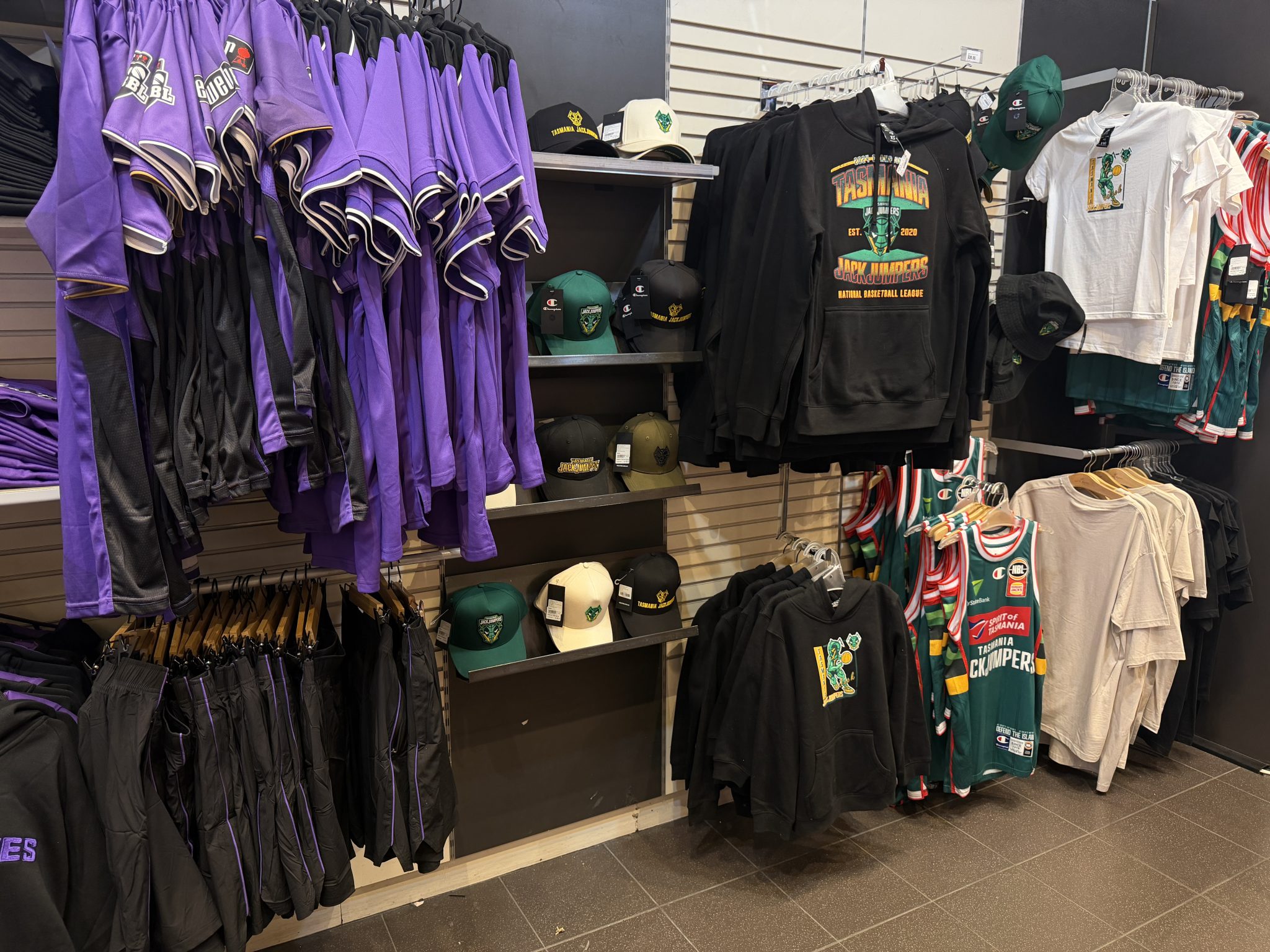 Retail store with Hobart Hurricanes and JackJumpers merchandise.